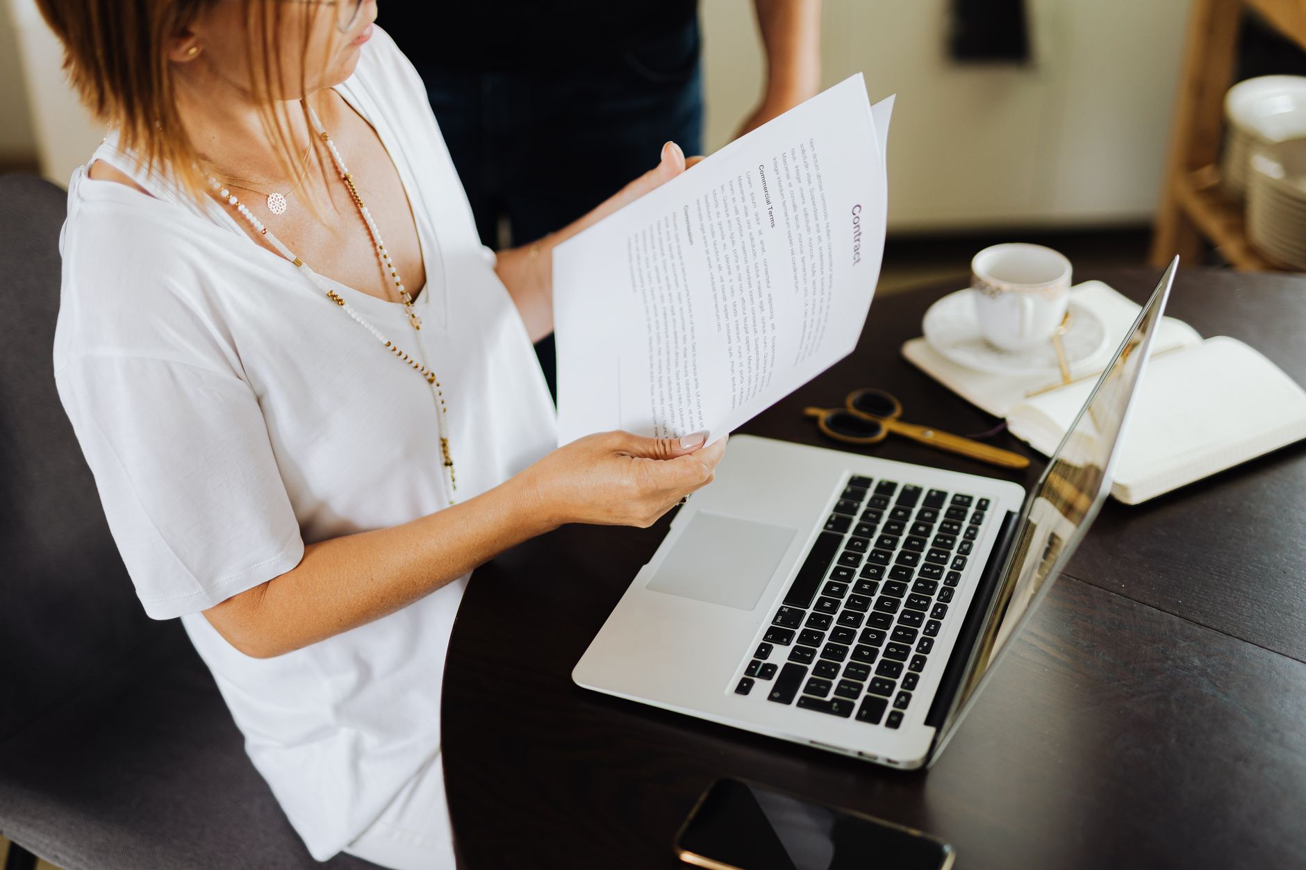 woman working laptop document