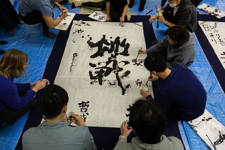 Choosing a theme, each team wrote words of their liking on a large sheet of paper.