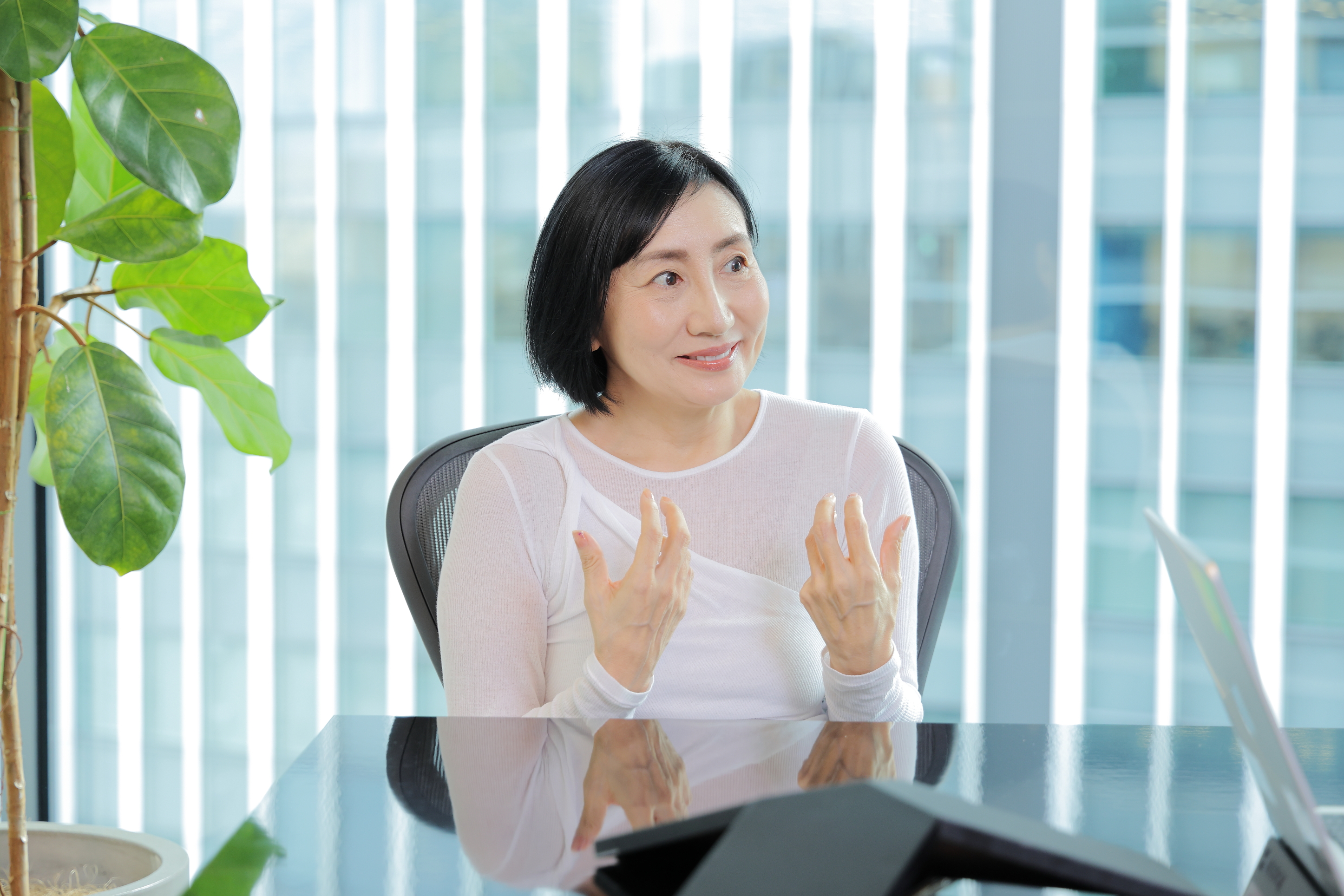 金融の成果を本能的な喜びや興奮として感じると話す関さん