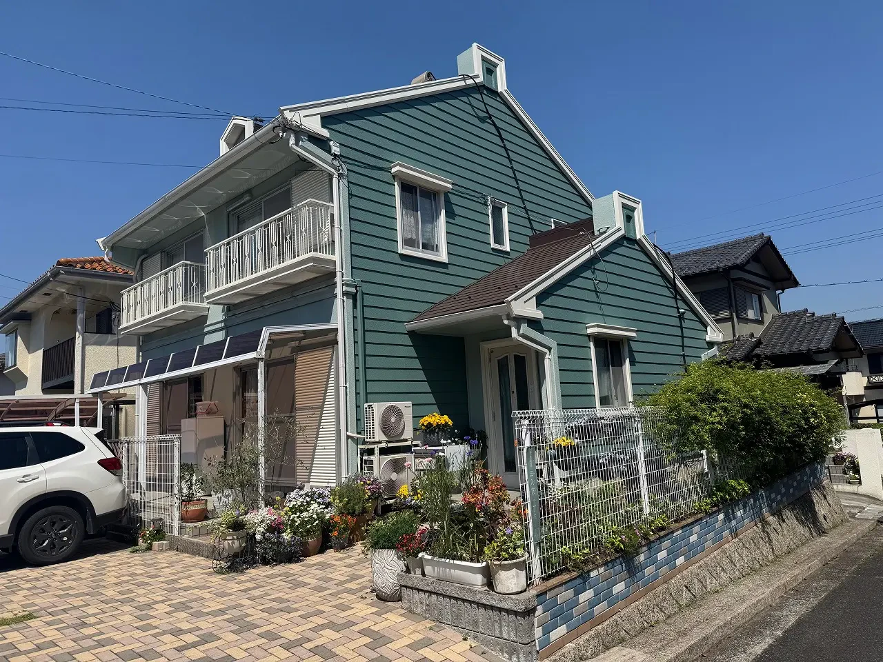 築４０年、『積水ハウス工業(株)』さんの不燃組立鉄骨構造２階建ての洋風住宅です。  屋根はスレート屋根(クボタ　カラーベスト　コロニアル) 広島市安佐北区三入東・Ｋ様サムネイル画像