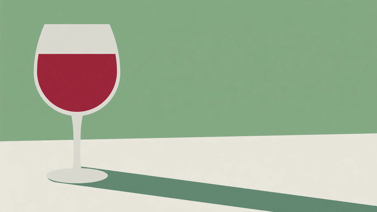 A single wine glass in a flat illustration