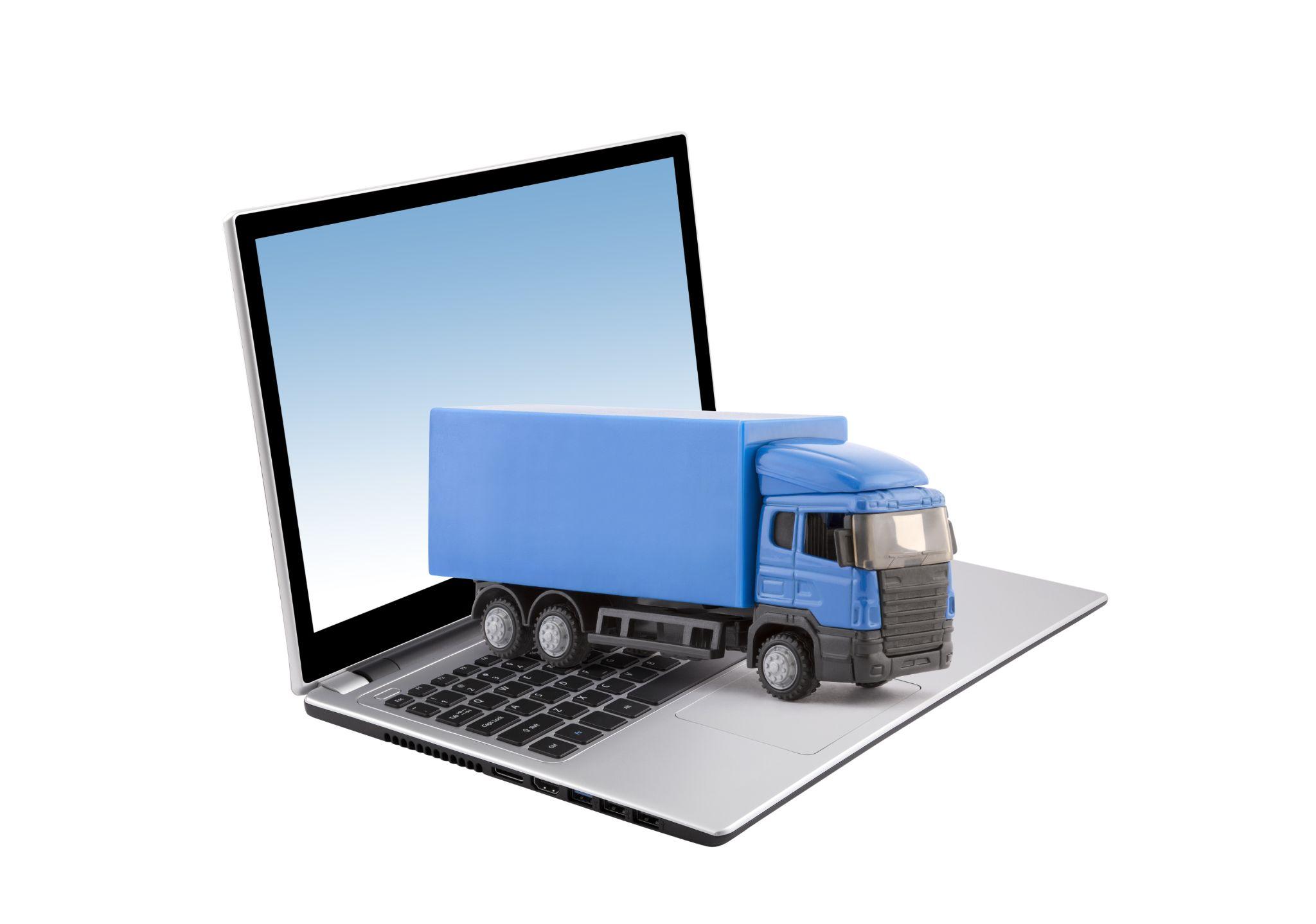 ノートパソコンから配送トラックが飛び出すイメージ。パソコンのレンタル・リースによる迅速な配送と効率的なIT機器調達の需要拡大を表す