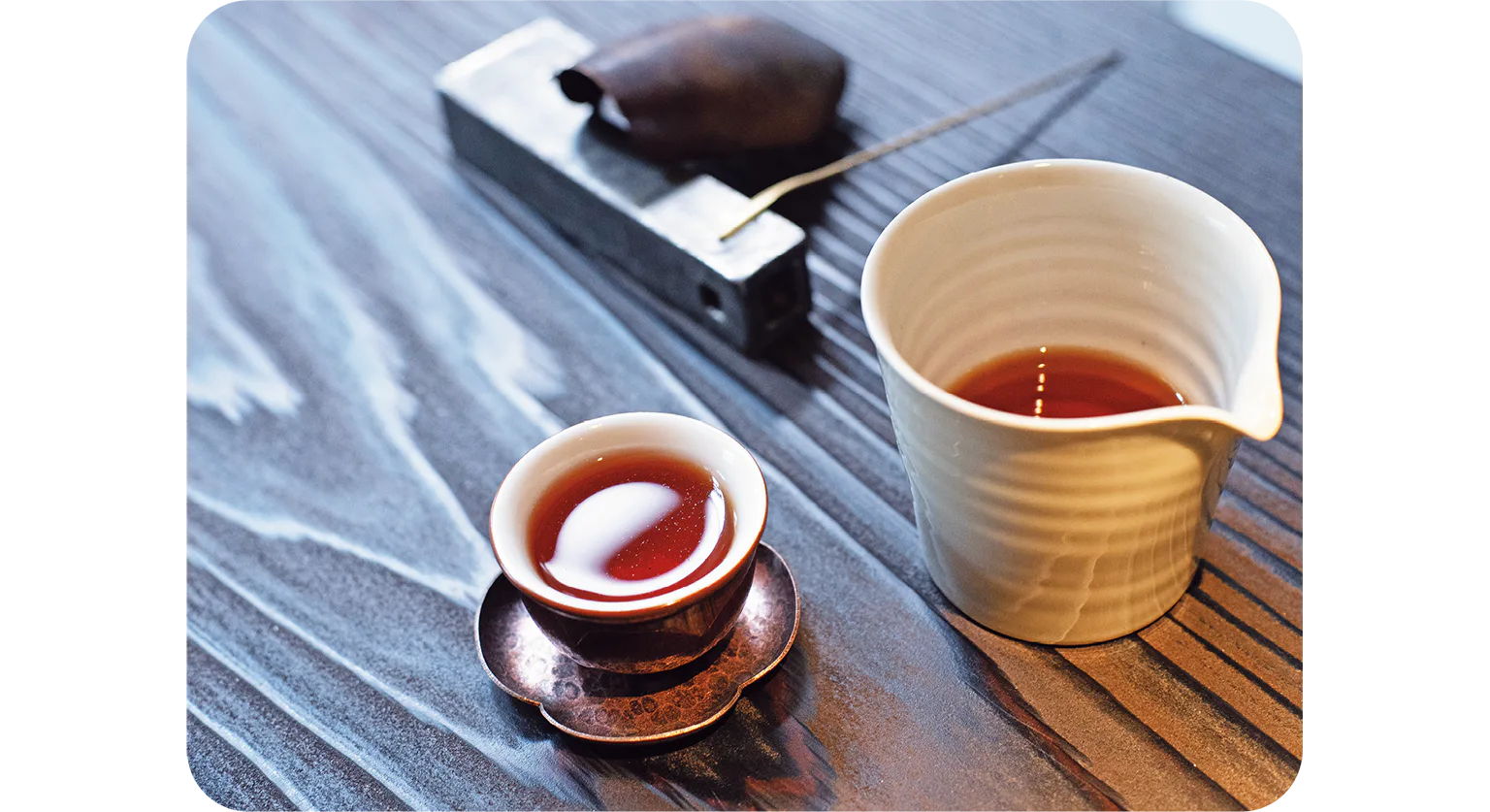 美しい琥珀色のお茶は1980年代のプーアール茶、一九八零年代 江城磚NT$650の画像