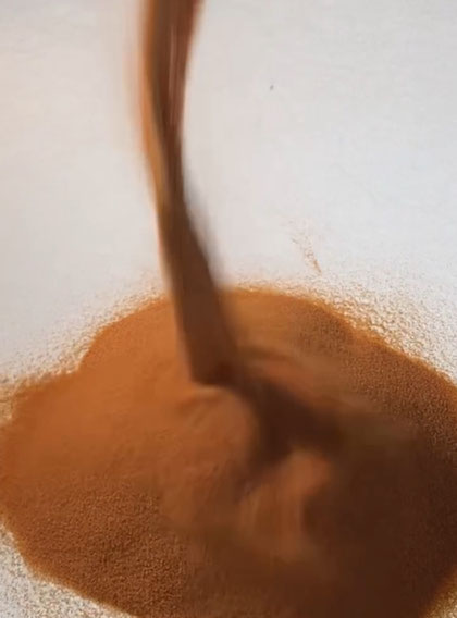 米国産の砂をダイナミックに落とす