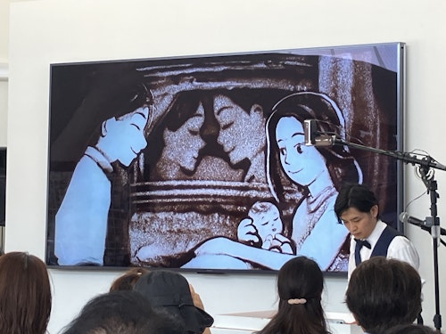 大阪・関西万博でサンドアートを実演するKohei