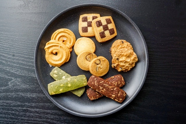 A plate of an assortment of cookies.