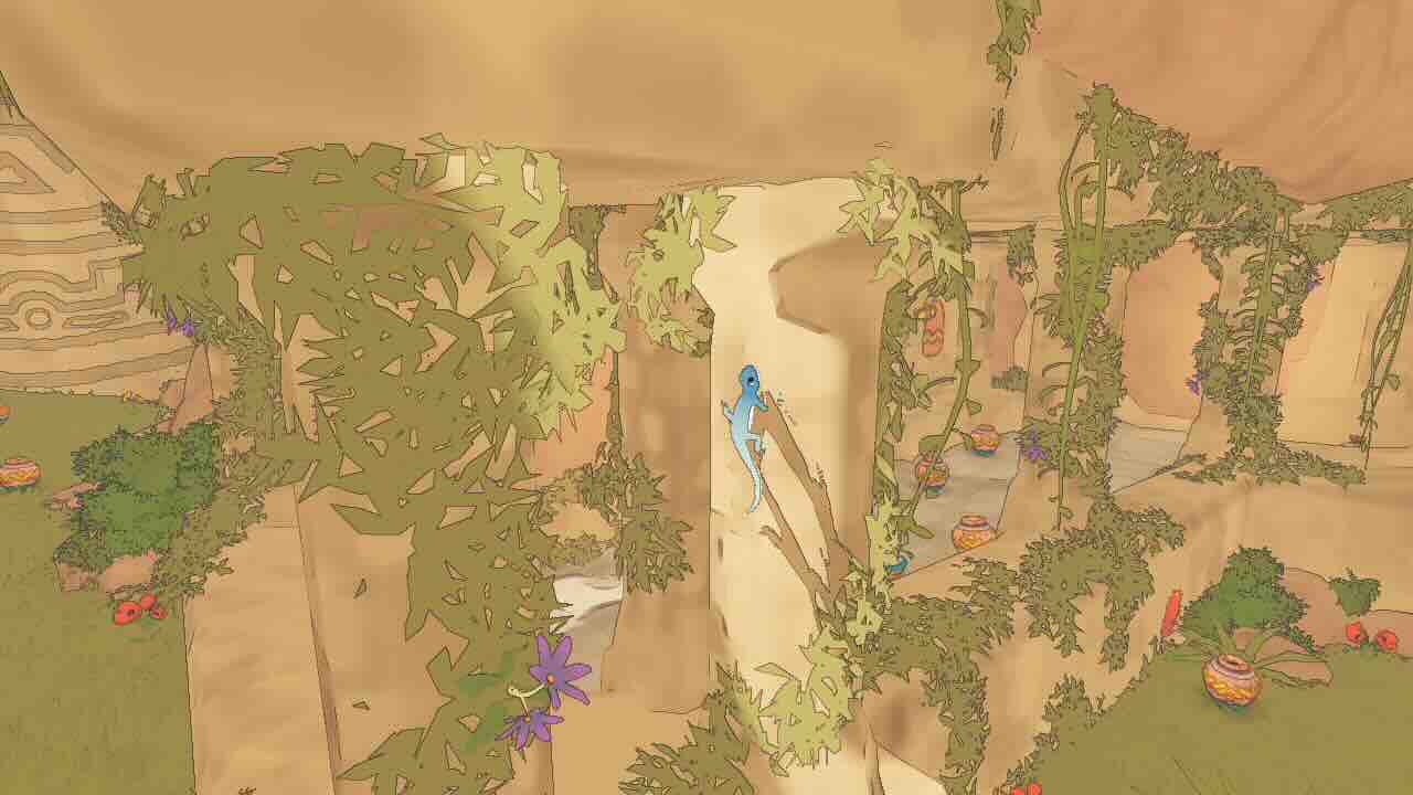 トカゲが草の生える柱の壁面に張り付いている。