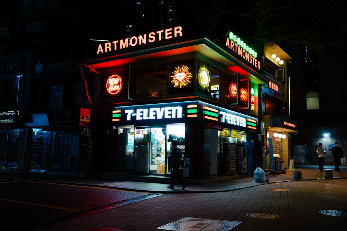a building with neon lights on the side of it