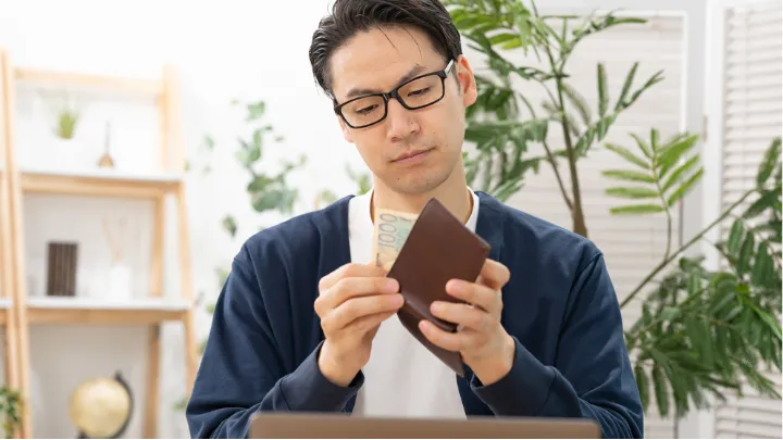 収入に困る様子 イメージ