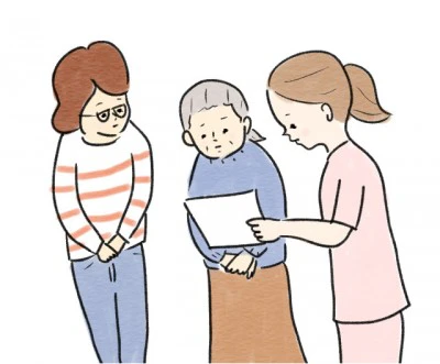 ご家族に説明文書を示し手渡しているイラスト