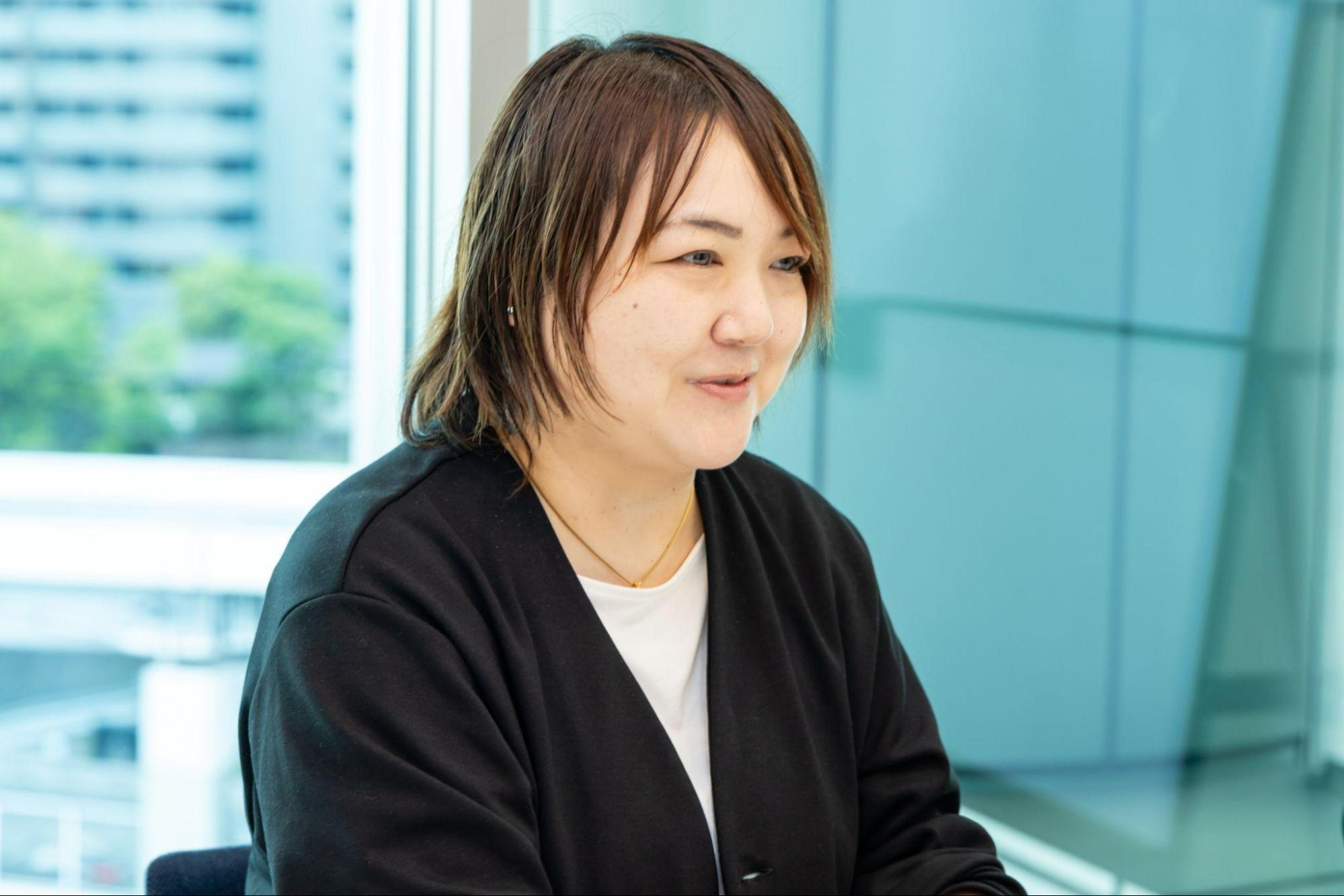津田さんがお話しされている様子