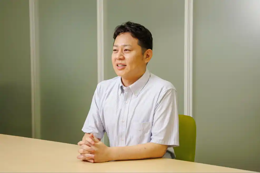 担当課長の亀井さん