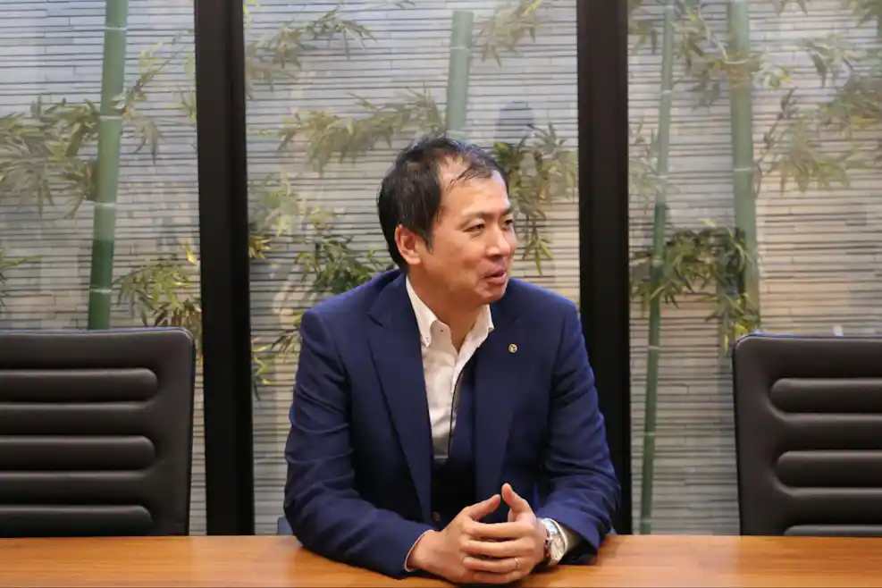 朝山さん:焼肉の名門 天壇 桂五条店の支配人。