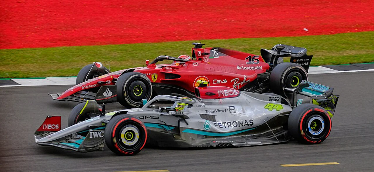 Ferrari's Charles Leclerc battles for the podium with Mercedes' Lewis Hamilton at the 2022 British Grand Prix at Silverstone. (52196620083) (cropped)