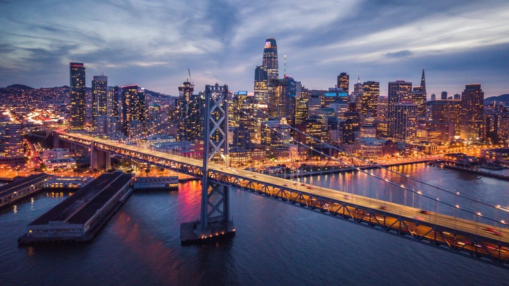 Aerial cityscape view of San Francisco and the Bay Bridge at Night